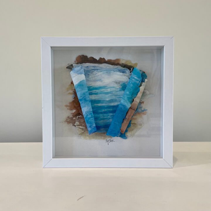 Available, July 2025. A white frame with a blue and white painting on it.